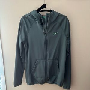 Grey/olive green women’s Nike Dri-fit zip up hoodie.